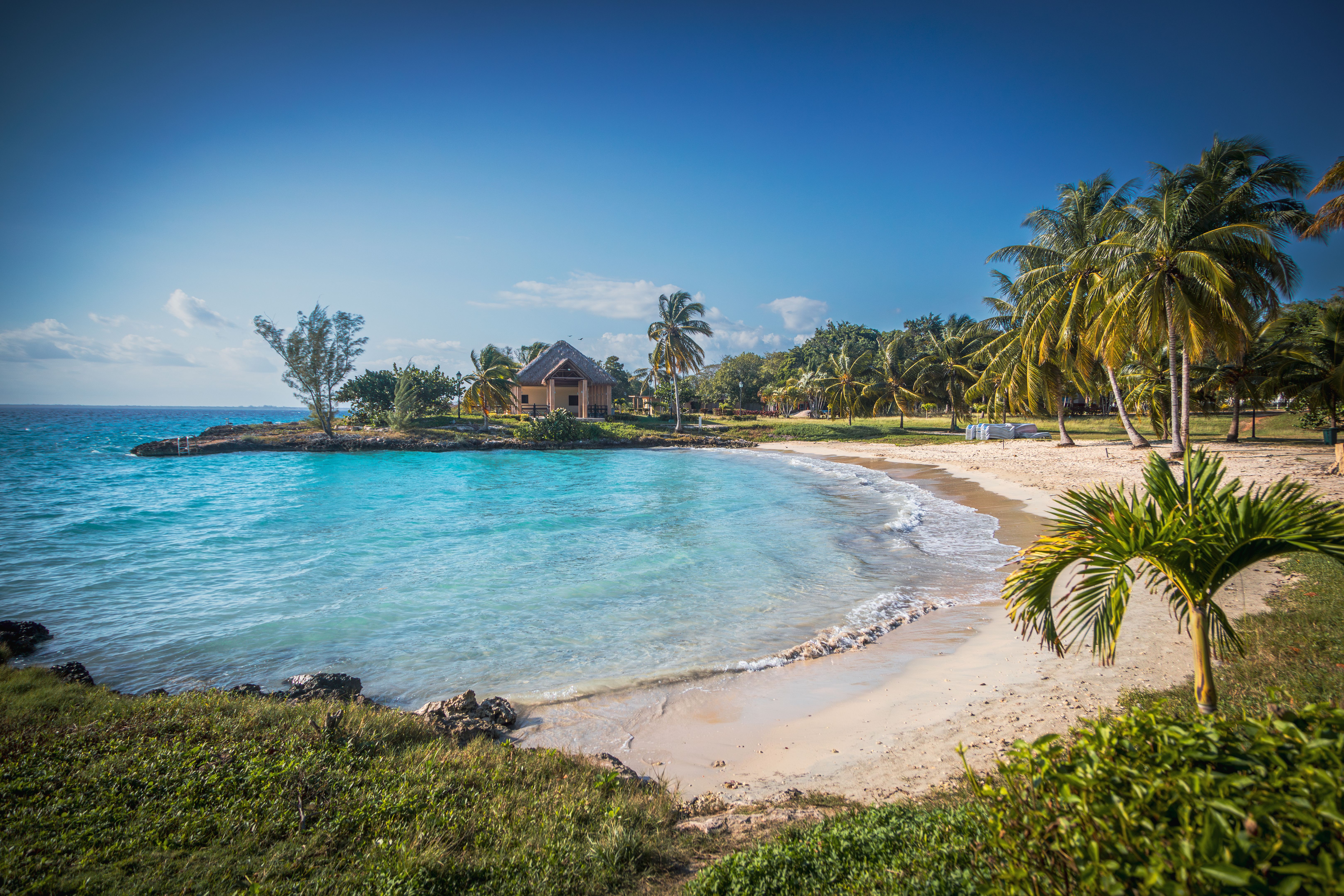 A small beach in front of the sea in Cuba.