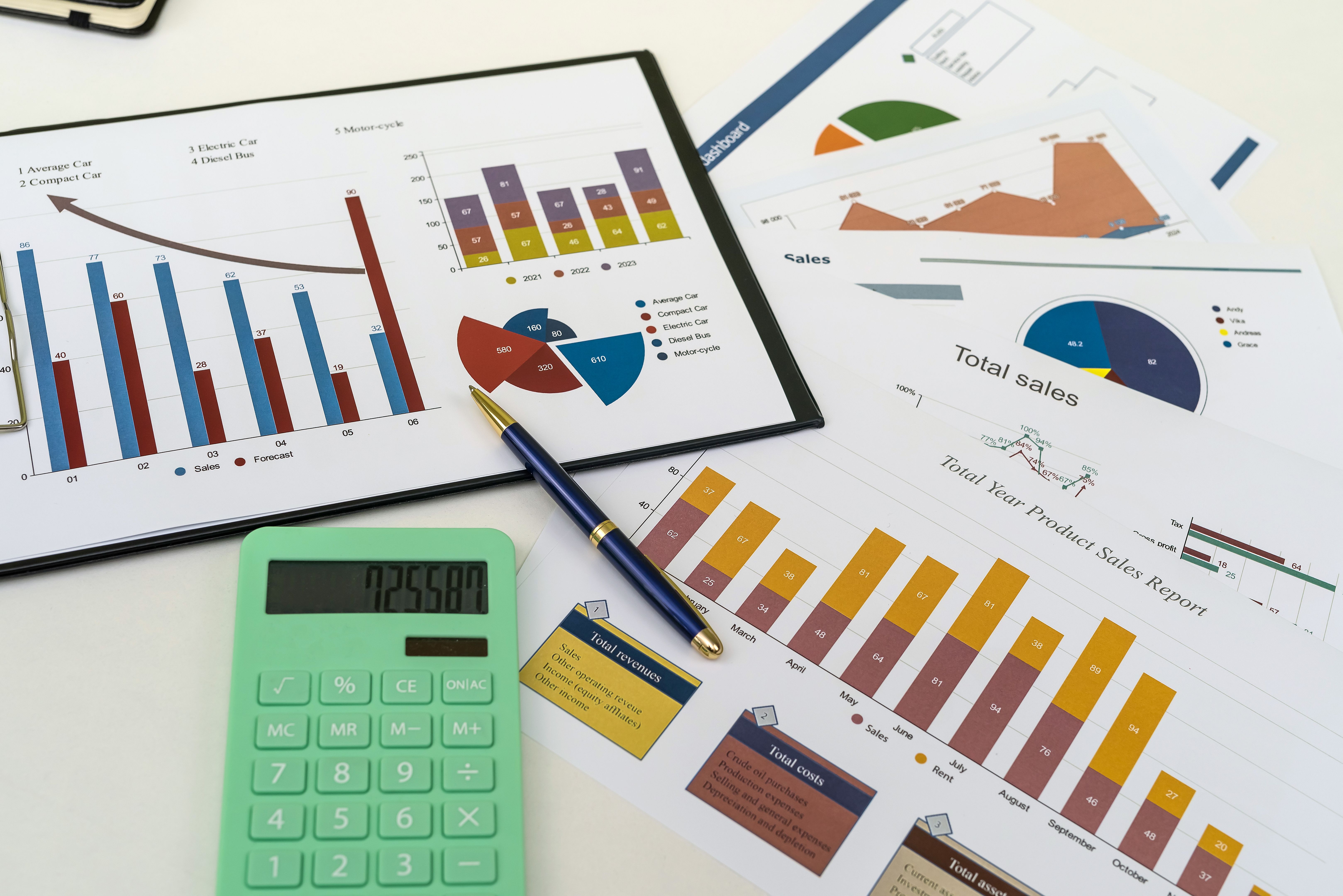 workplace with business graphs and charts