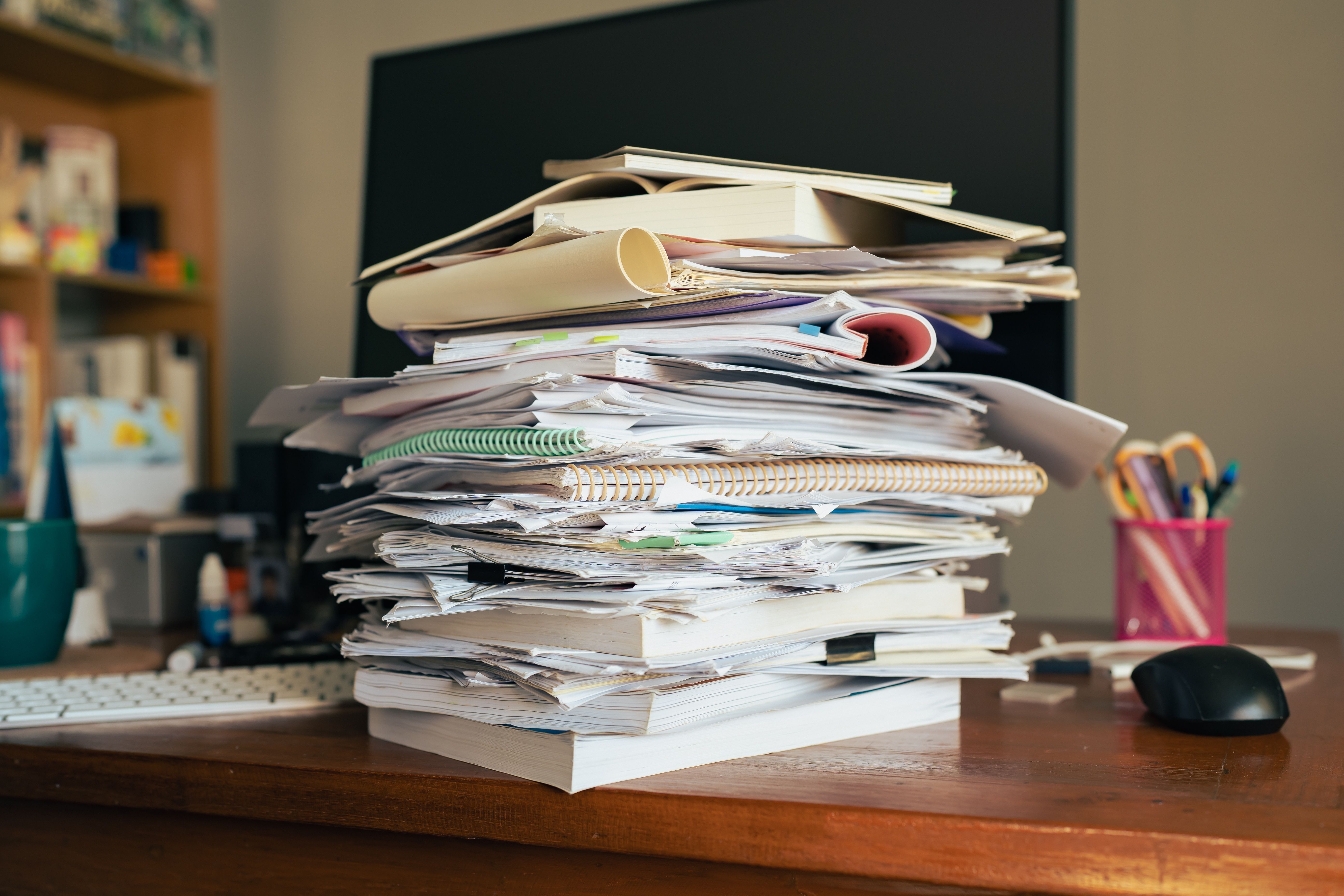 A pile of work on a table