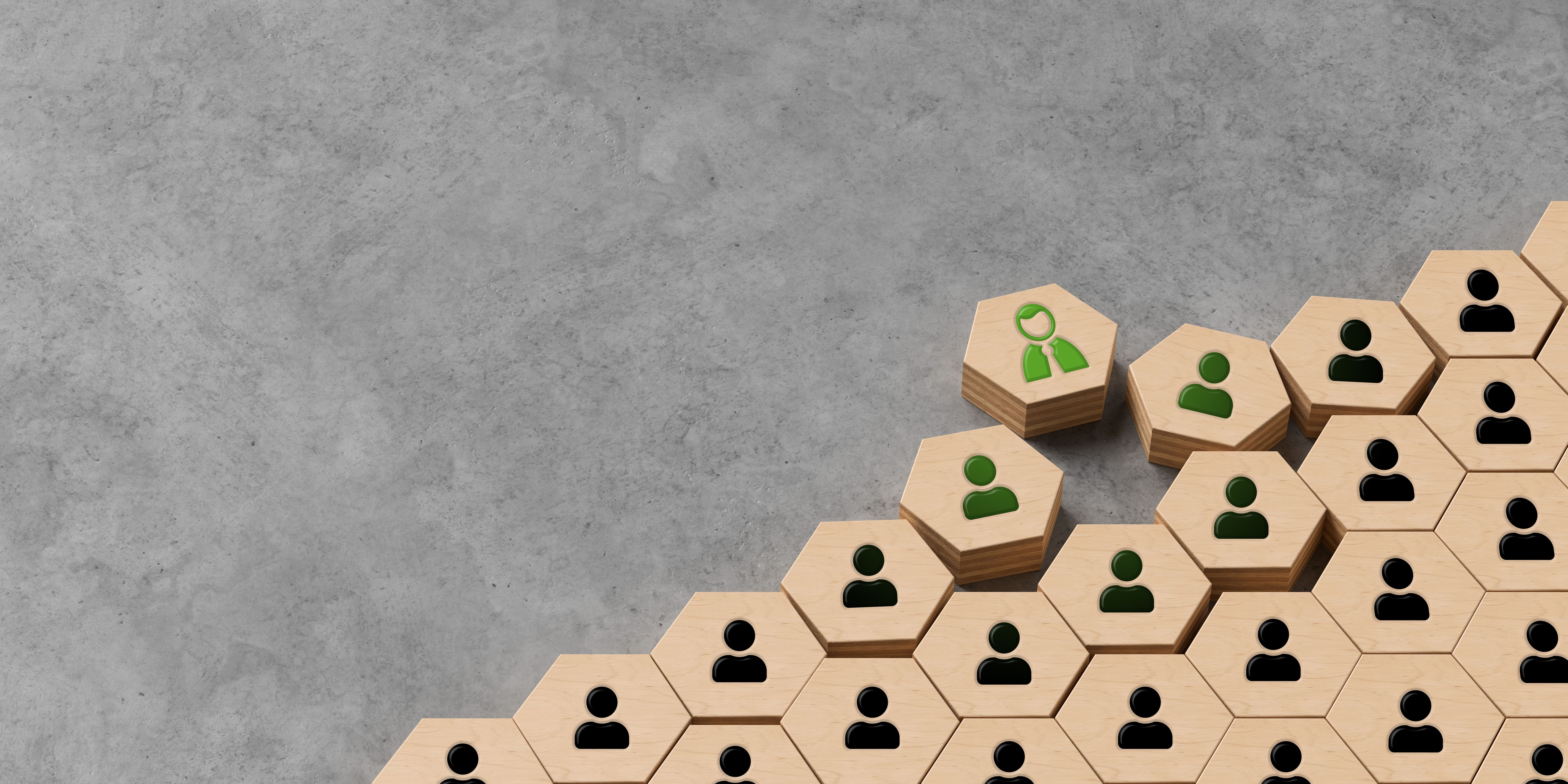 hexagon tile with a person symbol on it is moving up out of many hexagons with people symbols on it - 3d illustration hexagon tile with a person symbol on it is moving up out of many hexagons with people symbols on it - 3d illustration