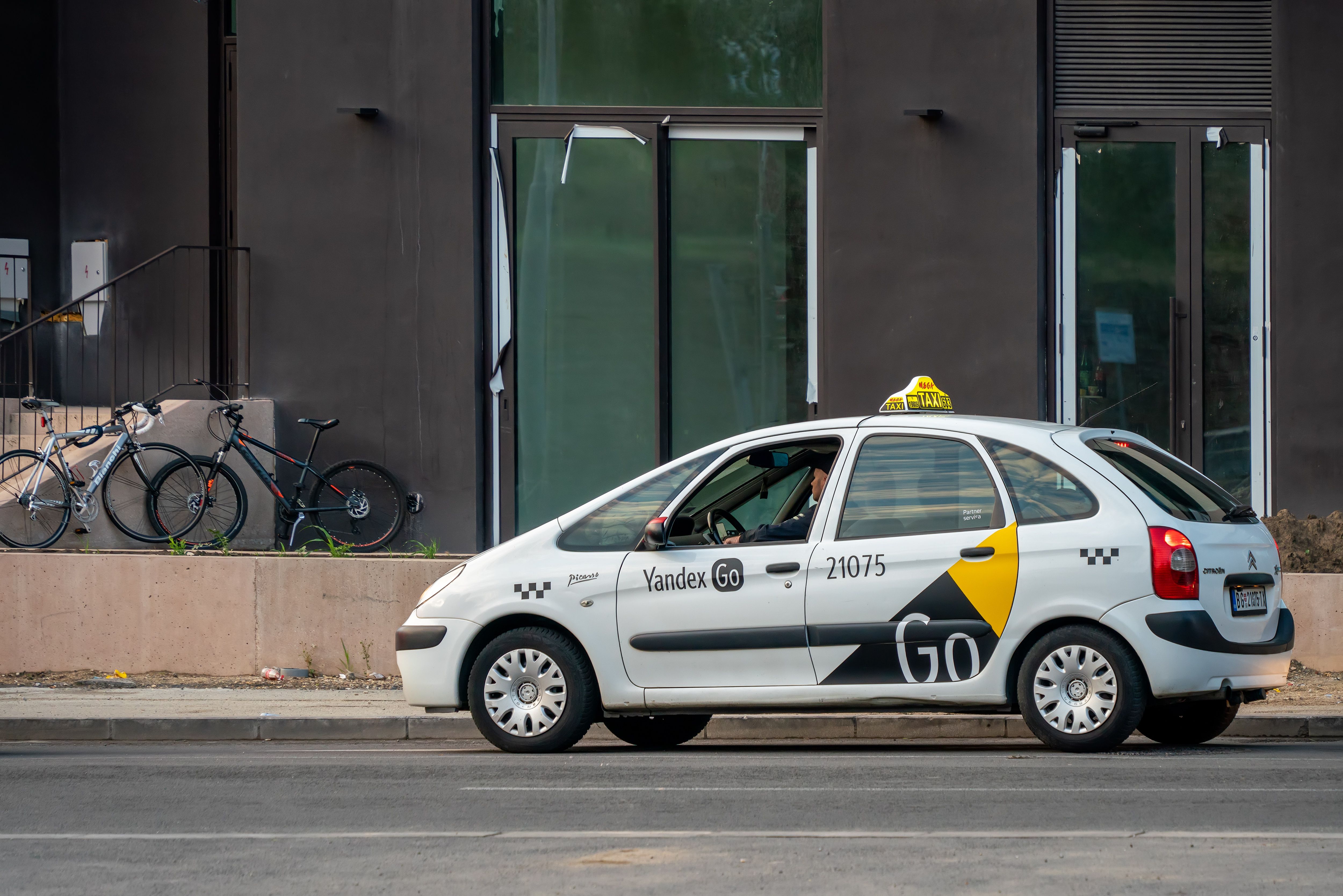 Russian's IT-giant's taxi service Yandex Go on the street of Belgrade, Serbia, 06.06.2023. Citroen Xsara Picasso. Russian's IT-giant's taxi service Yandex Go on the street of Belgrade, Serbia, 06.06.2023. Citroen Xsara Picasso.
