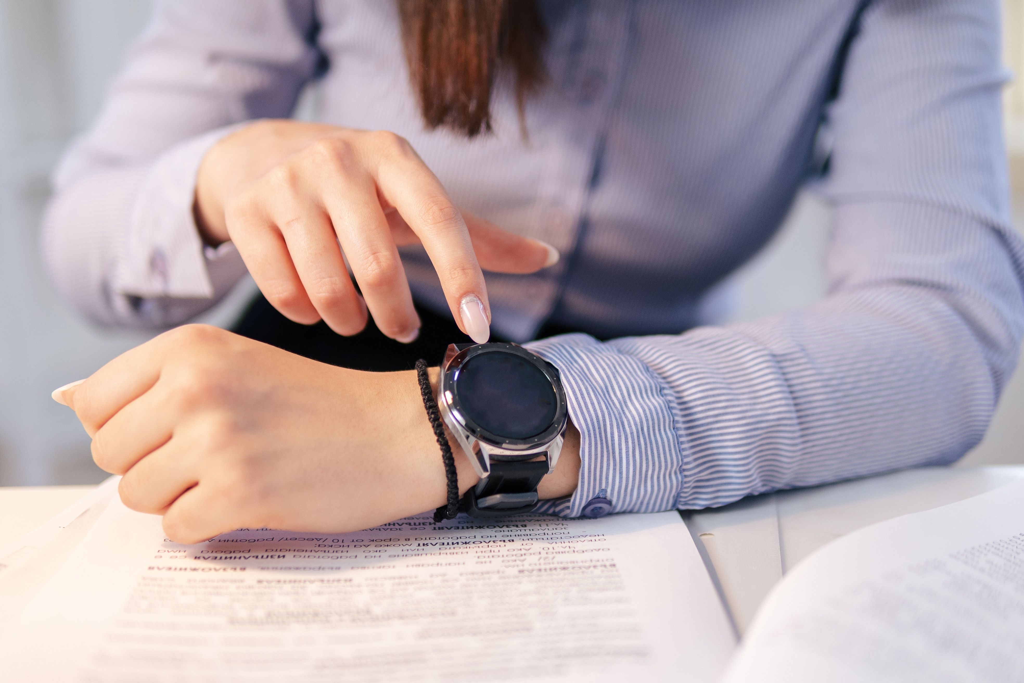 Close up of smart watch, woman browsing the menu. Close up of smart watch, woman browsing the menu.