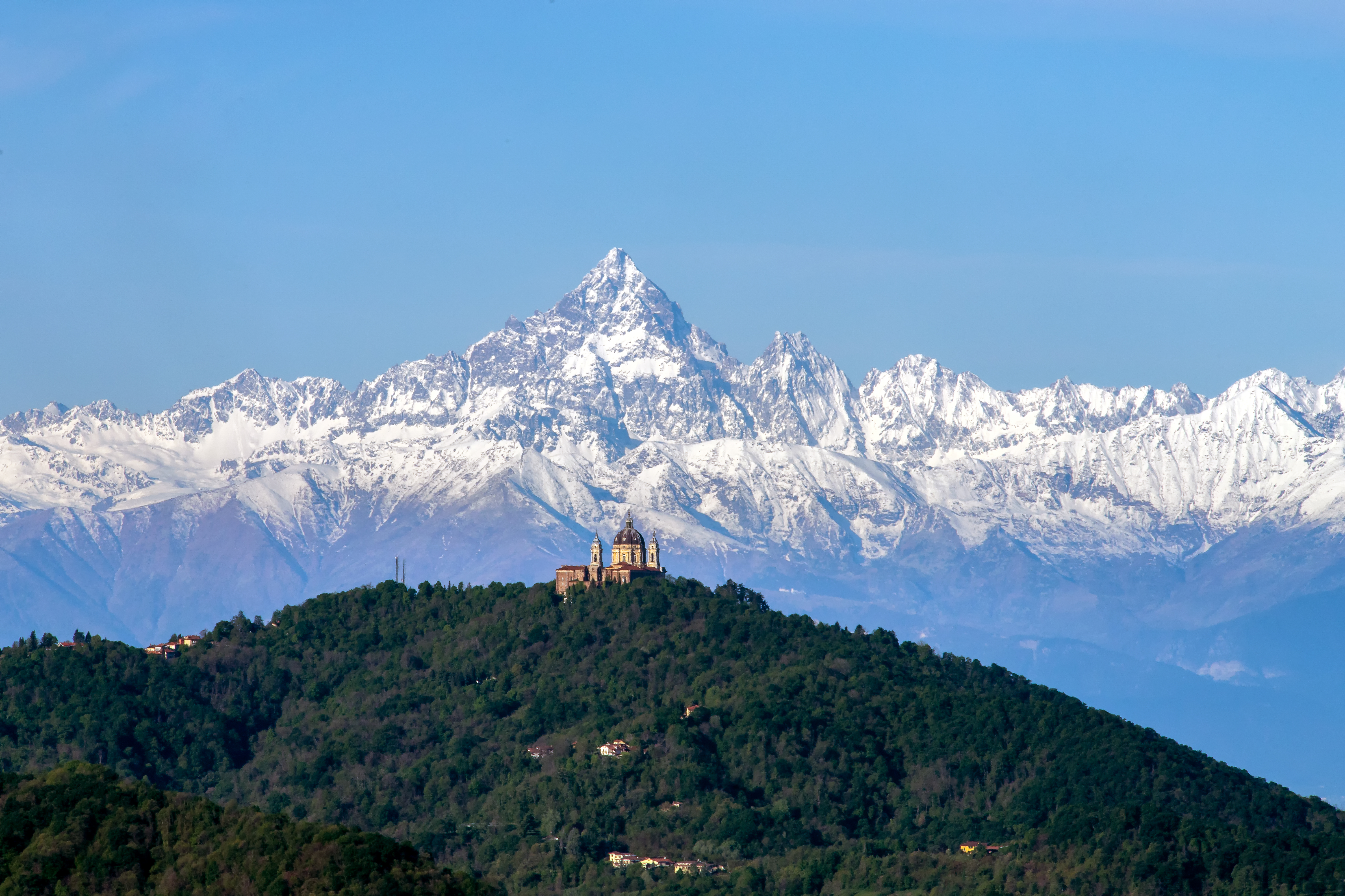 The Basilica of Superga (Italian: Basilica di Superga) and Momviso mountain aligned, Turin, Italy The Basilica of Superga (Italian: Basilica di Superga) and Momviso mountain aligned, Turin, Italy