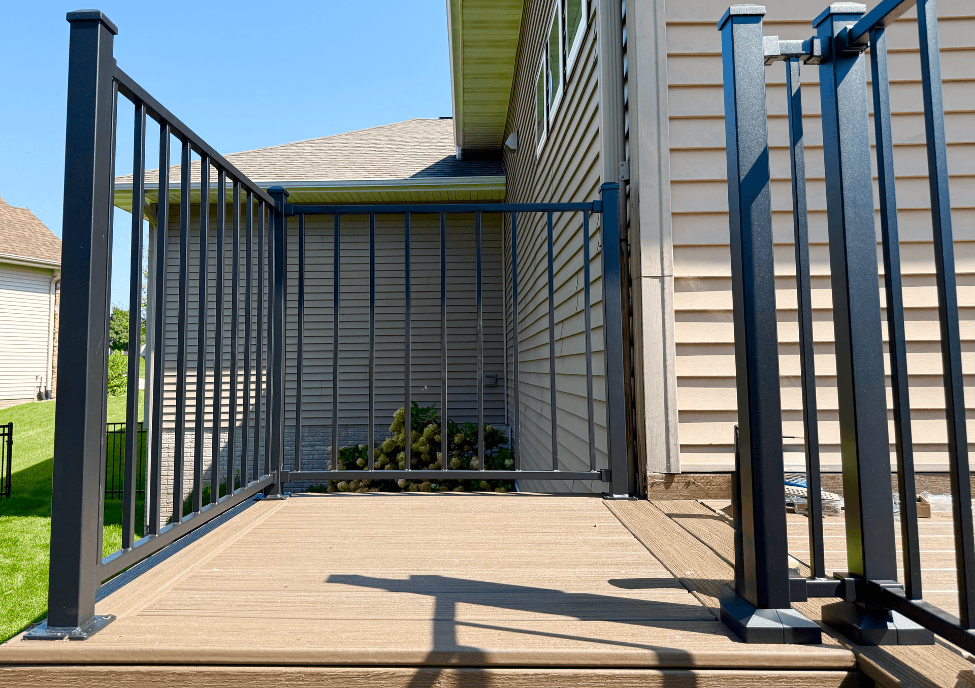 Composite deck with railings in Cedar Rapids