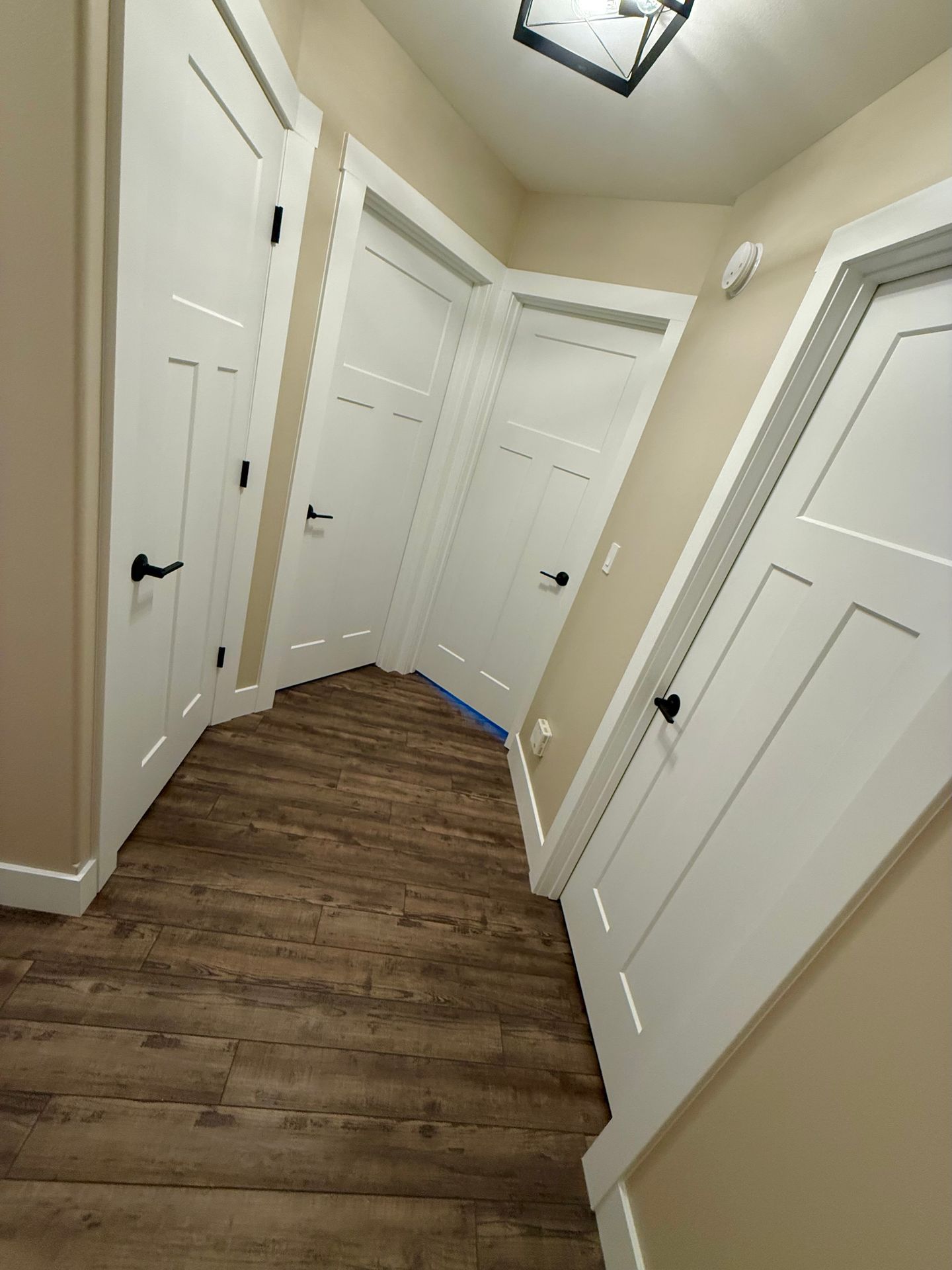 Prehung interior doors installed with new trim by Urban Edge Construction in Cedar Rapids, Iowa