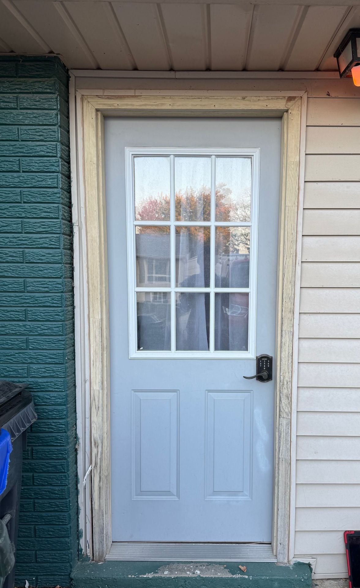 Old door before replacement in Cedar Rapids
