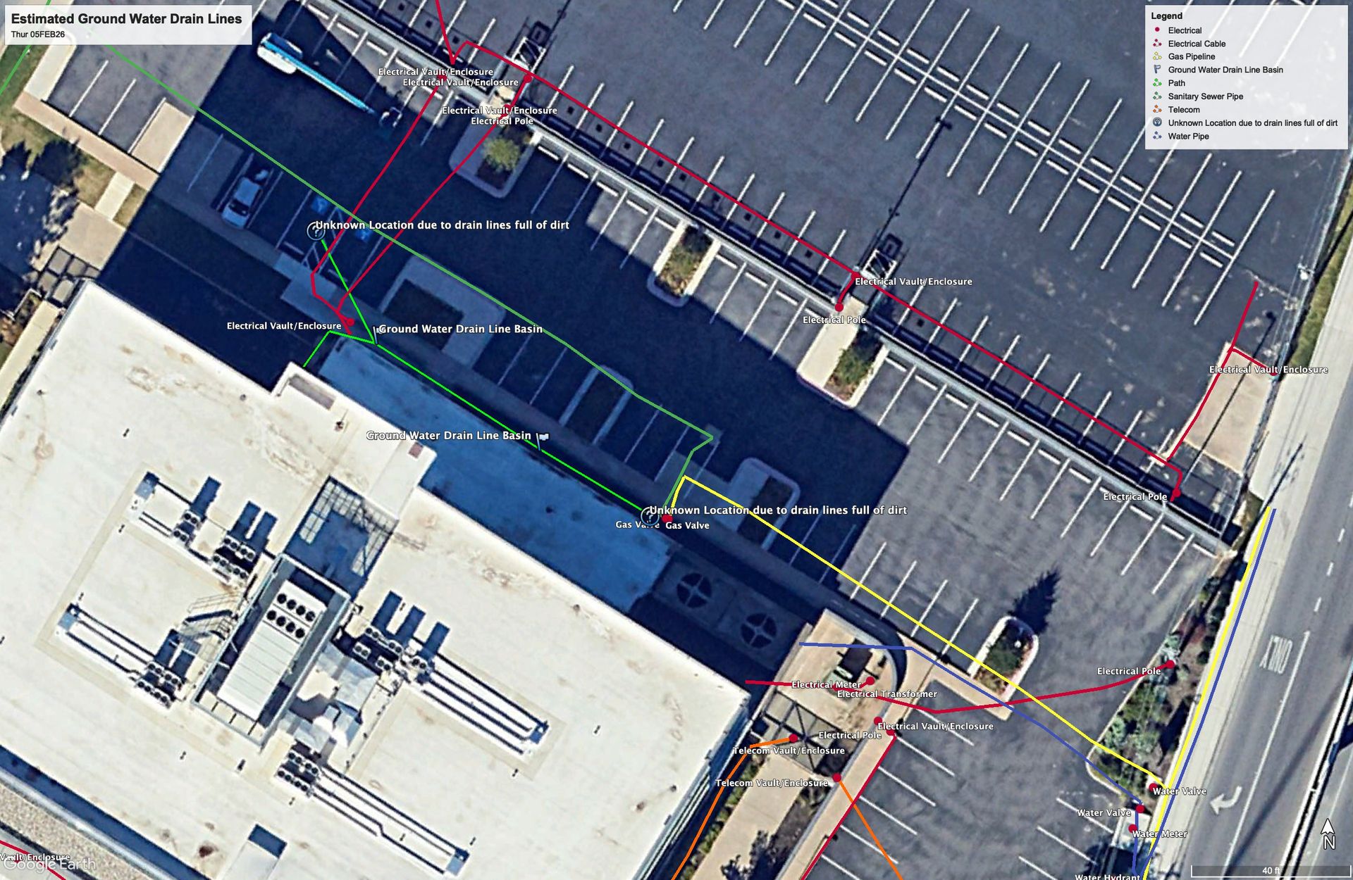 Georeferenced utility map showing color-coded underground lines over a site aerial