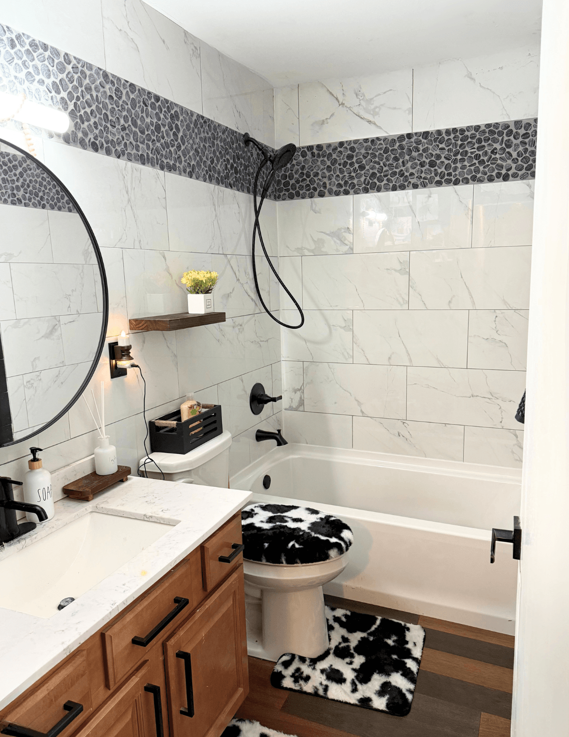 Bathroom after remodel by Urban Edge Construction in Cedar Rapids, Iowa — updated finishes and fixtures