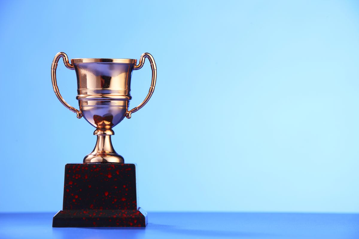 golden trophy on the blue background