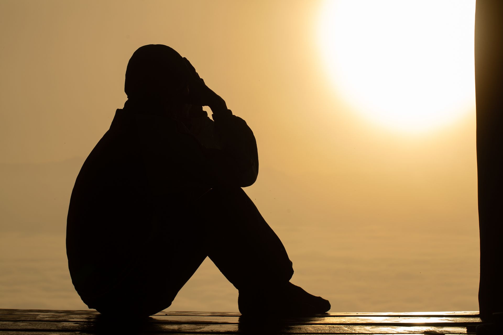 The silhouette of stressed and depressed man  of working  under pressure and hopefulness, Sad expression, sad emotion, despair, sadness.