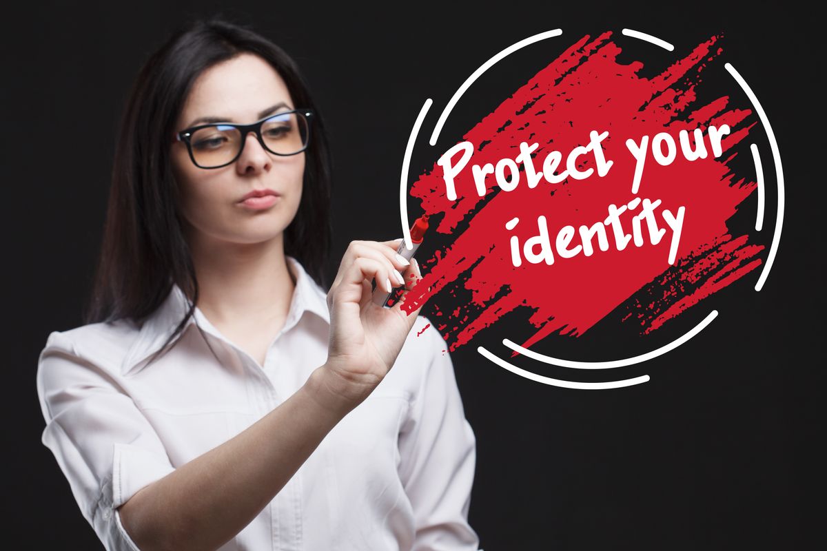 The concept of marketing, technology, the Internet and the network. A young businessman shows what is important for business: Protect your identity