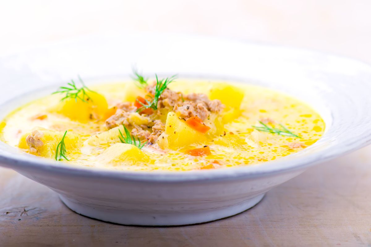 cheeseburger soup ,mincemeat and cheese soup. selective focus