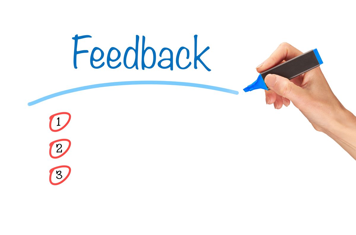 Feedback, written in marker on a clear screen. Feedback, written in marker on a clear screen.